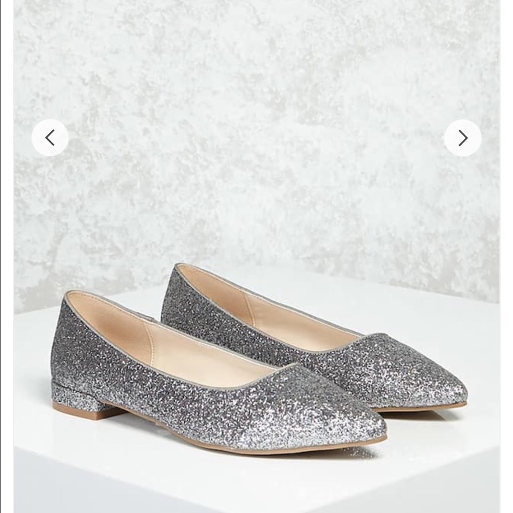 Brand New. Metallic Silver Flats